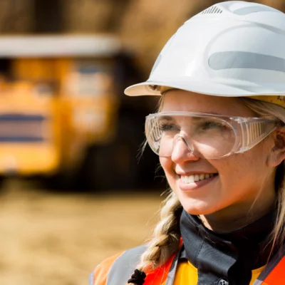 Female mining student wearing a helmet